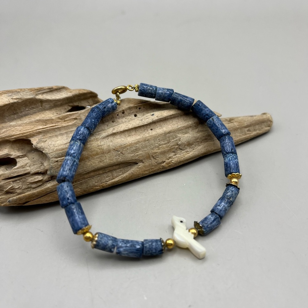 Blue Sodalite and Gold Beaded Bracelet with White Carved Bird Accent -handmade